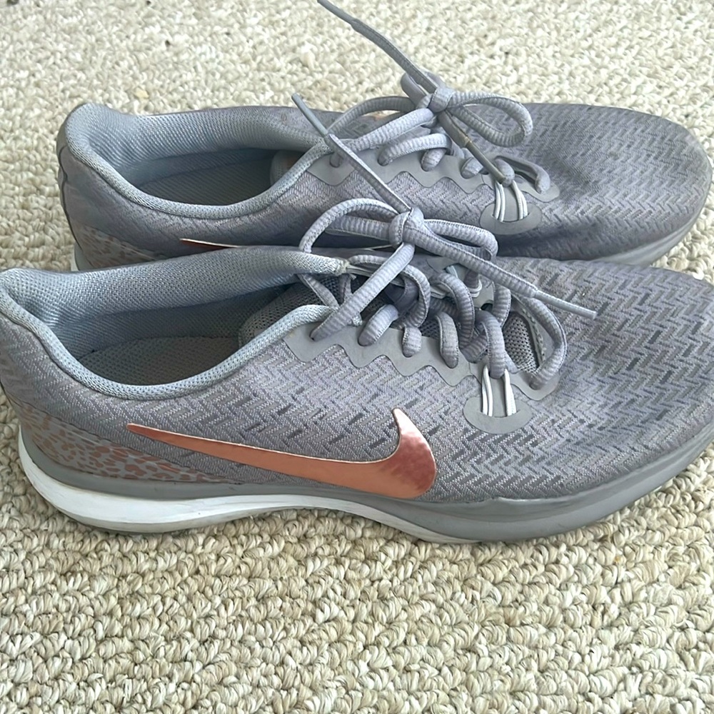 Women’s grey and rose gold cheetah Nikes